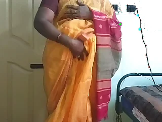 desi  indian horny tamil telugu kannada malayalam hindi premier wife vanitha crippling orange colour saree  showing big titties and shaved pussy press hard titties press nip rubbing pussy masturbation